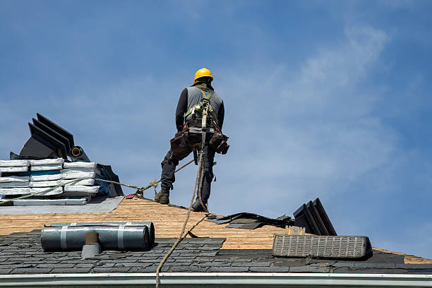 Professional Roof Replacement technician working in Plains, KS